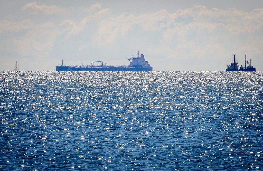 17 August 2025, Mecklenburg-Western Pomerania, Sassnitz: The tanker "Eventin" is still off the coast of the island of Rügen. The tanker "Eventin", which was confiscated by German customs, is still close to the Baltic Sea island of Rügen. The tanker is one of more than 150 ships in the so-called Russian shadow fleet, which is subject to EU sanctions. The "Eventin" drifted in the Baltic Sea for hours in January 2025, unable to maneuver. According to earlier reports, the Panama-flagged ship had around 100,000 tons of oil on board. Photo: Jens Büttner/dpa (Photo by JENS BUTTNER / dpa Picture-Alliance via AFP)