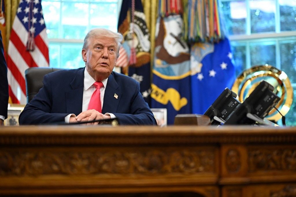 US President Donald Trump speaks after signing a presidential proclamation honoring the 90th anniversary of the Social Security Act in the Oval Office of the White House in Washington, DC, on August 14, 2025. (Photo by Mandel NGAN / AFP)