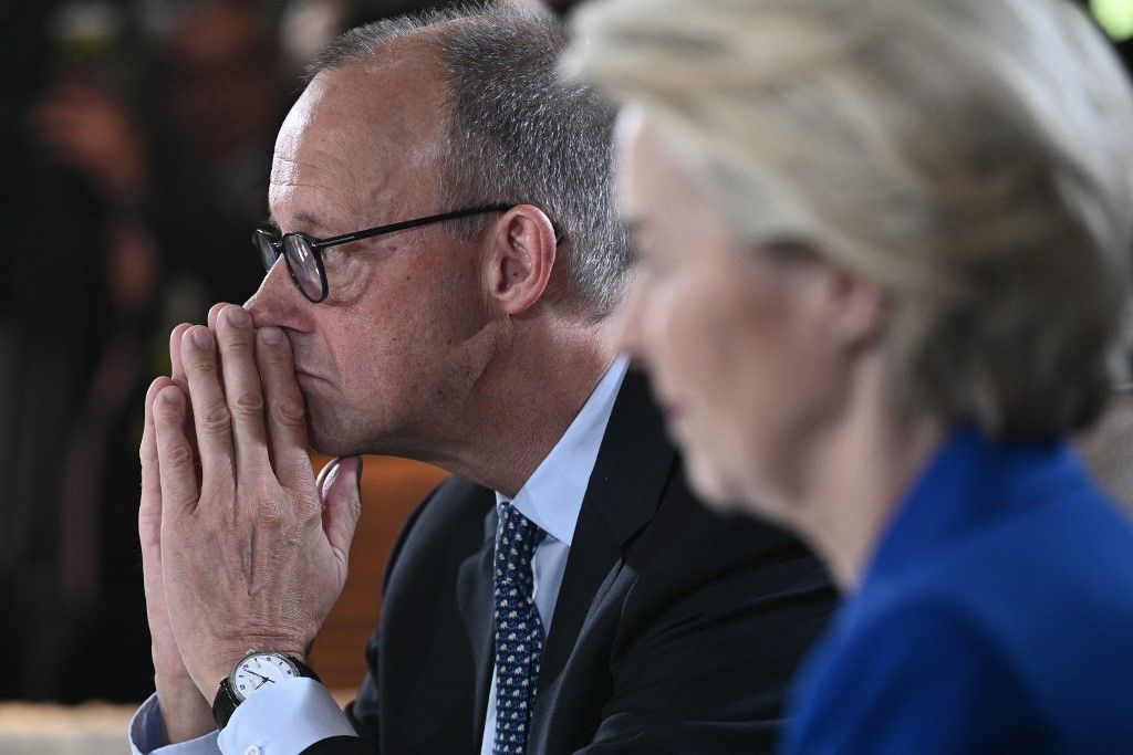 (L/R) German Chancellor Friedrich Merz and European Commission President Ursula Von der Leyen attend a working session during the Group of Seven (G7) Summit at the Pomeroy Kananaskis Mountain Lodge in Kananaskis, Alberta, Canada on June 16, 2025. (Photo by Brendan SMIALOWSKI / AFP)