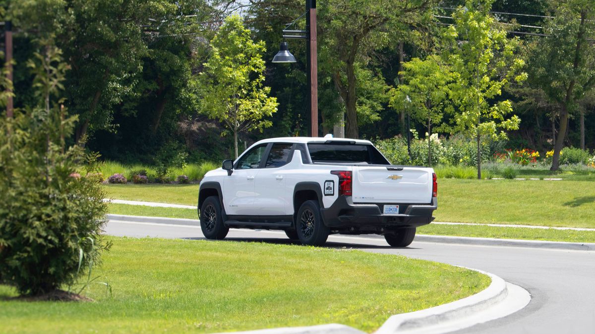 The 2026 Chevrolet Silverado EV Max Range Work Truck in Summit White during its range test along the roads of Milford, Michigan.