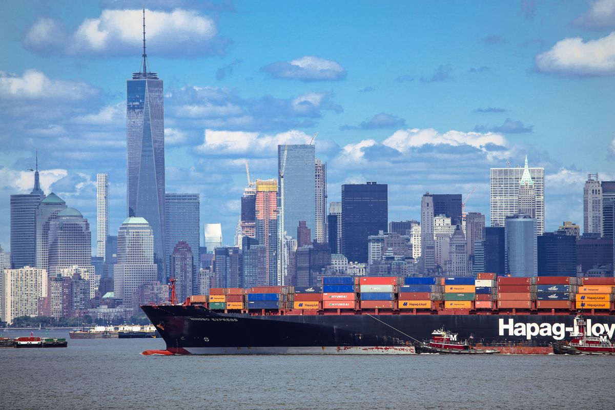 New York, US - March, 27 2025: Large container ship with import products enters port in New York