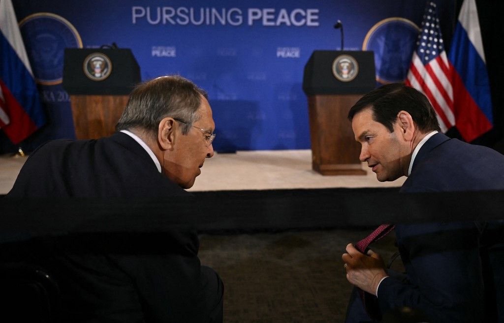 Russian Foreign Minister Sergei Lavrov (L) and US Secretary of State Marco Rubio chat while waiting for US President Donald Trump and Russian President Vladimir Putin's joint press conference after participating in a US-Russia summit on Ukraine at Joint Base Elmendorf-Richardson in Anchorage, Alaska, on August 15, 2025. (Photo by Andrew CABALLERO-REYNOLDS / AFP)