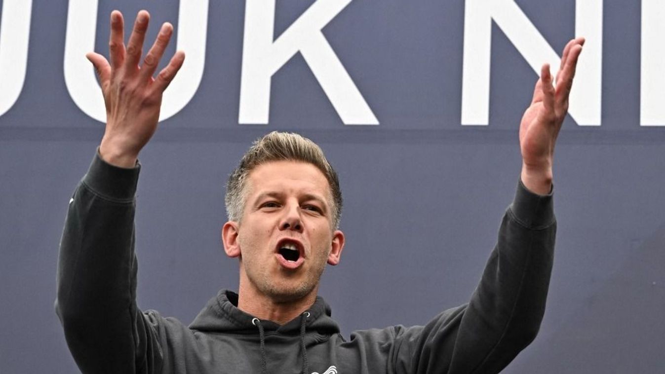 Leader of TISZA party Peter Magyar addresses activists and sympathisers of the Hungary's TISZA (Respect and Freedom) party during a demonstration in Budapest on April 13, 2025. The TISZA party has concluded a two-week self-styled "referendum" on Sunday. T