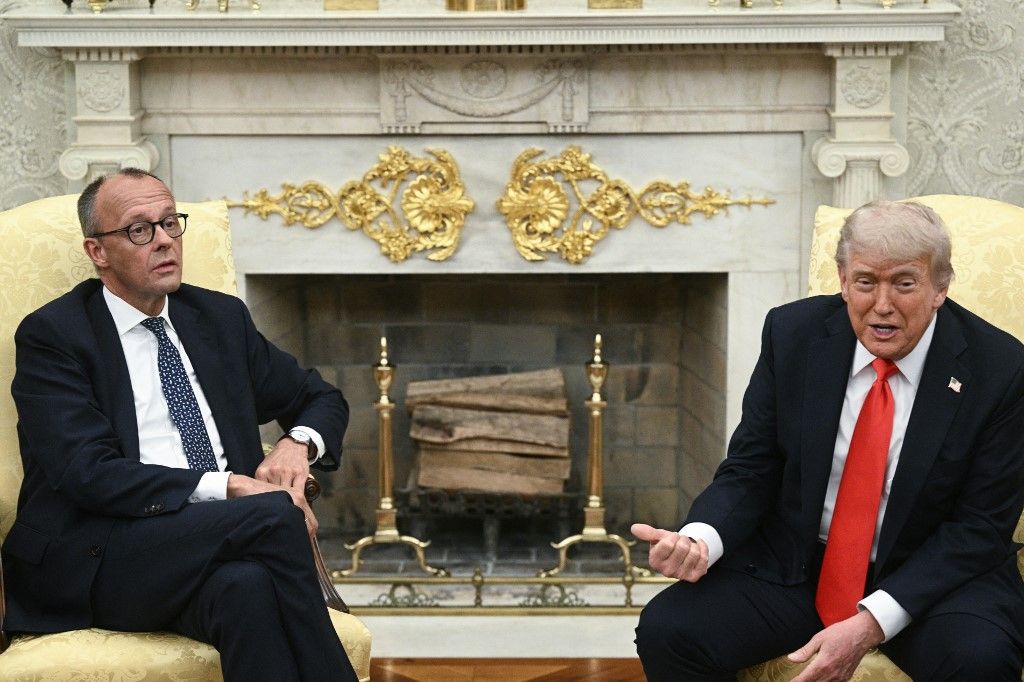US President Donald Trump speaks during a meeting with German Chancellor Friedrich Merz (L) in the Oval Office of the White House in Washington, DC, on June 5, 2025. A month into his job, the conservative Merz, 69, will try to build a rapport with the mercurial Trump as he seeks to maintain good ties with the country he considers post-war Germany's "indispensable" ally. (Photo by Brendan SMIALOWSKI / AFP)