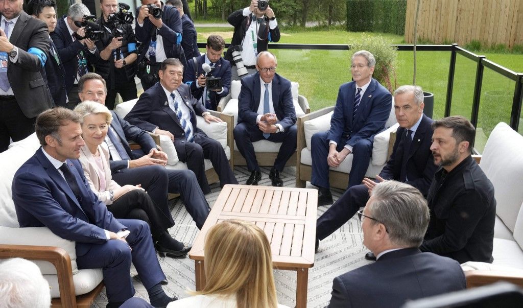 Leaders of various countries attend the G7 summit discussions in Kananaskis, western Canada, on June 17, 2025. (Clockwise from front left) French President Emmanuel Macron, European Commission, President Ursula von der Leyen, NATO Secretary General Mark Rutte, Japan's Prime Minister Shigeru Ishiba, German Chancellor Friedrich Merz, U.S. Treasury Secretary Scott Bessent, Canadas Prime Minister Mark Carney, Ukrainian President Zelensky, Britain's Prime Minister Keir Starmer and Italian Prime Minister Giorgia Meloni. ( The Yomiuri Shimbun ) (Photo by Pool for Yomiuri / The Yomiuri Shimbun via AFP)
