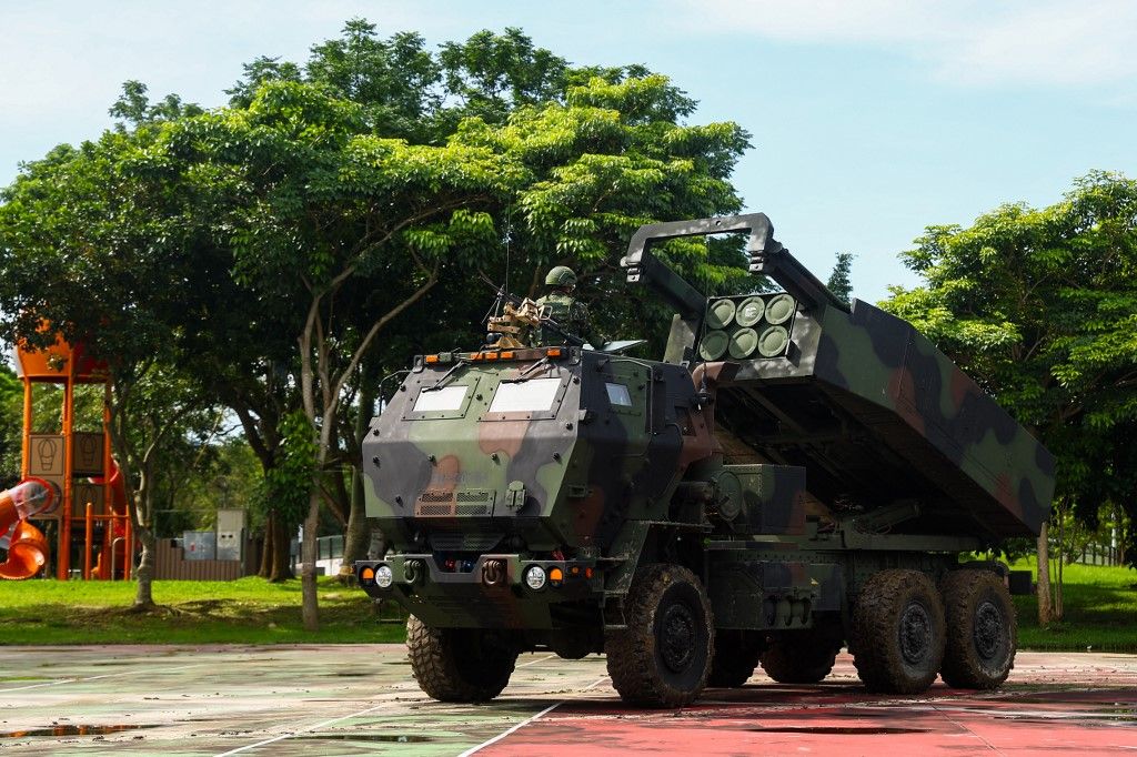 TAICHUNG, TAIWAN - JULY 12: Soldiers of the 58th Artillery Command mobolize the HIMARS missile system to a tactical position, as part of the ongoing Han Kuang military exercise, in Taichung, Taiwan, on July 12, 2025. This is the first time for Taiwan to deploy the M142 High Mobility Artillery Rocket System (HIMARS) to this year's biggest-ever annual Han Kuang military exercise, which can be equipped with multiple 227mm rockets, or a single Army Tactical Missile System (ATACMS)  that comes with a range of up to 300 kilometers. The 29 assets procured from the United States are part of Taipei's efforts to cope with escalating threats in the Taiwan Strait, as China has increased activities of the People's Liberation Army around the self-governing island. Daniel Ceng / Anadolu (Photo by Daniel Ceng / Anadolu via AFP)