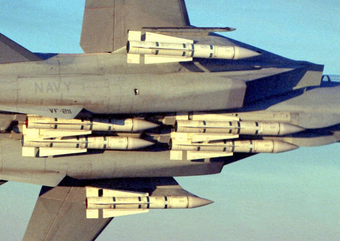 A Fighter Squadron 211 (VF-211) F-14A Tomcat aircraft banks into a turn during a flight out of Naval Air Station, Miramar, Calif.  The aircraft is carrying six AIM-54 Phoenix missiles.
