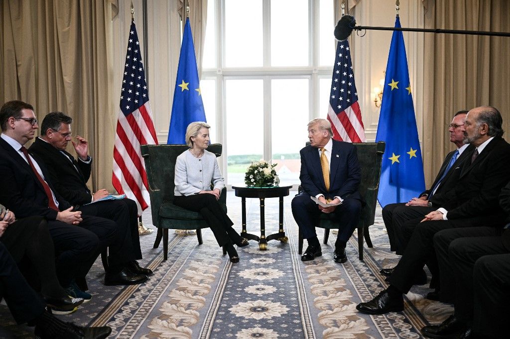 US President Donald Trump (R) and European Commission President Ursula von der Leyen (L) speak to the press after agreeing on a trade deal between the two economies following their meeting, in Turnberry south west Scotland on July 27, 2025, on the third day of his visit to the country, since his second tenure as President began. US President Donald Trump said on July 27, 2025 that he had reached a trade agreement with European Union chief Ursula von der Leyen. "We have reached a deal. It's a good deal for everybody," Trump told reporters after talks with von der Leyen at his golf resort in Turnberry, Scotland. The EU chief also hailed it as a "good deal". (Photo by Brendan SMIALOWSKI / AFP)