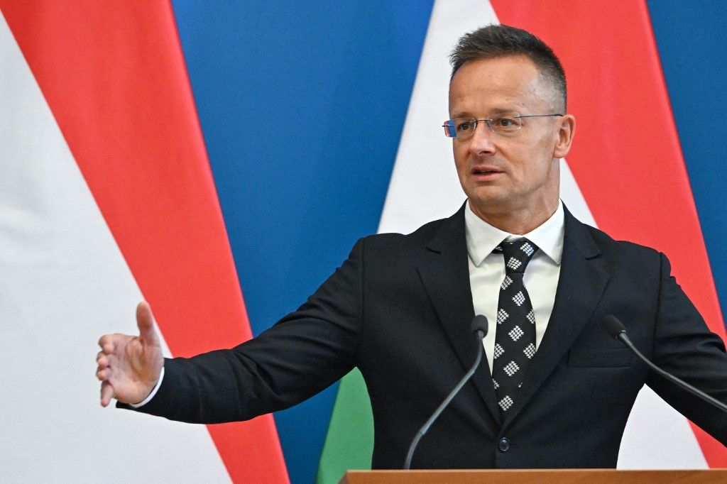 Hungarian Foreign and Trade Minister Peter Szijjarto gestures during a joint press conference with the Bosnian Serb leader at the Foreign Ministry in Budapest, Hungary, on September 4, 2025. (Photo by Attila KISBENEDEK / AFP)