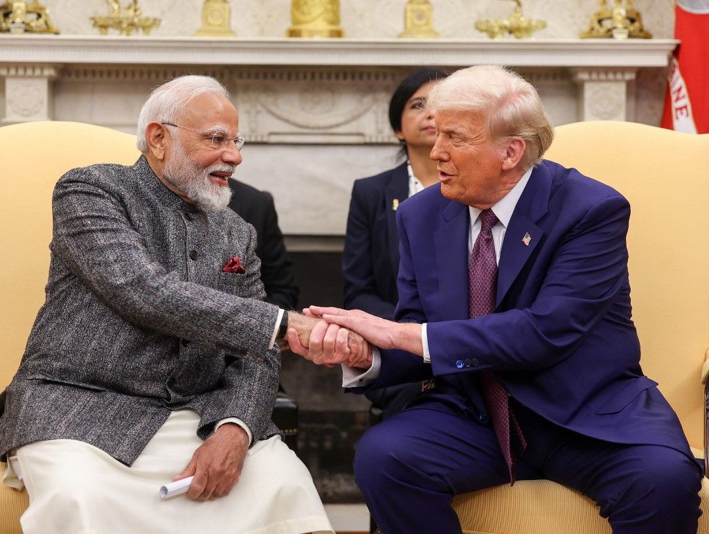 WASHINGTON DC, UNITED STATES - FEBRUARY 13: (----EDITORIAL USE ONLY - MANDATORY CREDIT - 'INDIAN PRESS INFORMATION BUREAU / HANDOUT' - NO MARKETING NO ADVERTISING CAMPAIGNS - DISTRIBUTED AS A SERVICE TO CLIENTS----) US President Donald Trump meets with Indian Prime Minister Narendra Modi at the White House in Washington DC, United States on February 13, 2025. Indian Press Information Bureau / Handout / Anadolu (Photo by Indian Press Information Bureau / Anadolu via AFP)