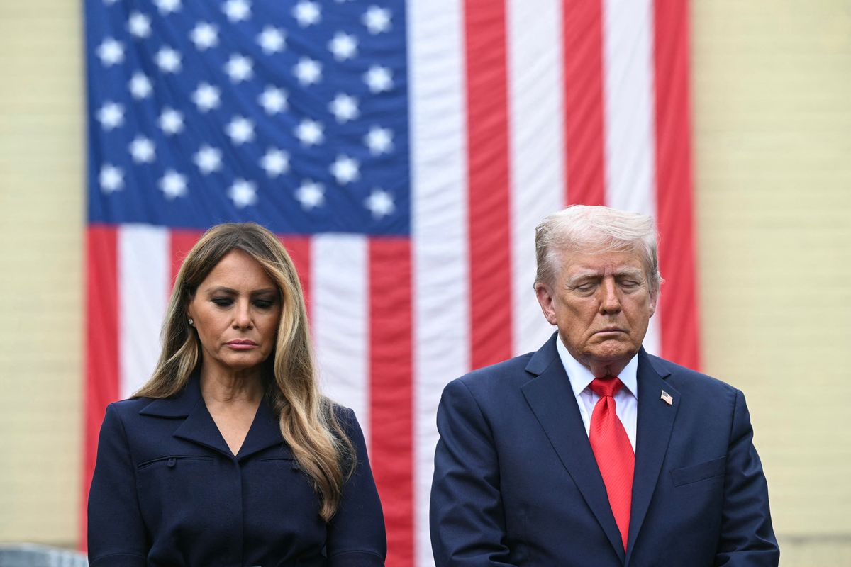 US President Donald Trump and First Lady Melania Trump attend a 9/11 observance ceremony at the National 9/11 Pentagon Memorial in Washington, DC on September 11, 2025. (Photo by SAUL LOEB / AFP)