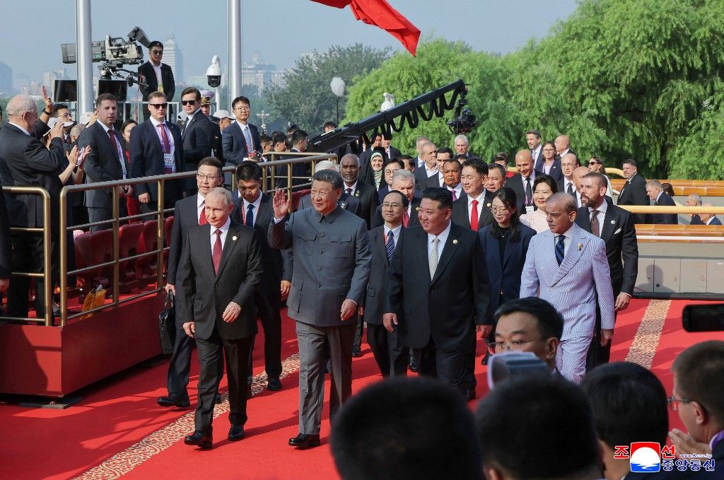 This picture taken on September 3, 2025 and released from North Korea's official Korean Central News Agency (KCNA) on September 4, 2025 shows (front L-R) Russia's President Vladimir Putin, China's President Xi Jinping and North Korean leader Kim Jong Un arriving to a military parade marking the 80th anniversary of victory over Japan and the end of World War II, in Beijings Tiananmen Square. (Photo by KCNA VIA KNS / AFP) / South Korea OUT / ---EDITORS NOTE--- RESTRICTED TO EDITORIAL USE - MANDATORY CREDIT "AFP PHOTO/KCNA VIA KNS" - NO MARKETING NO ADVERTISING CAMPAIGNS - DISTRIBUTED AS A SERVICE TO CLIENTS / THIS PICTURE WAS MADE AVAILABLE BY A THIRD PARTY. AFP CAN NOT INDEPENDENTLY VERIFY THE AUTHENTICITY, LOCATION, DATE AND CONTENT OF THIS IMAGE --- / 