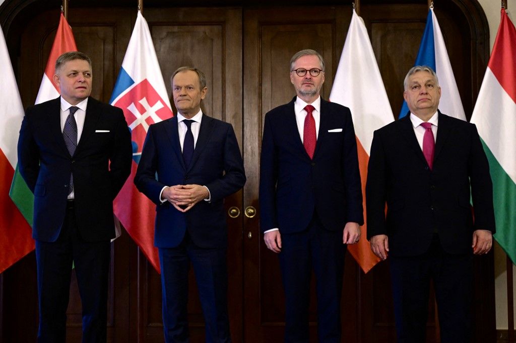 (L-R) Slovakia's Prime Minister Robert Fico, Poland's Prime Minister Donald Tusk, Hungary's Prime Minister Viktor Orban and Czech Republic's Prime Minister Petr Fiala pose for a family picture prior to the Visegrad Group (V4) meeting on February 27, 2024 in Prague, Czech Republic. (Photo by Michal Cizek / AFP)