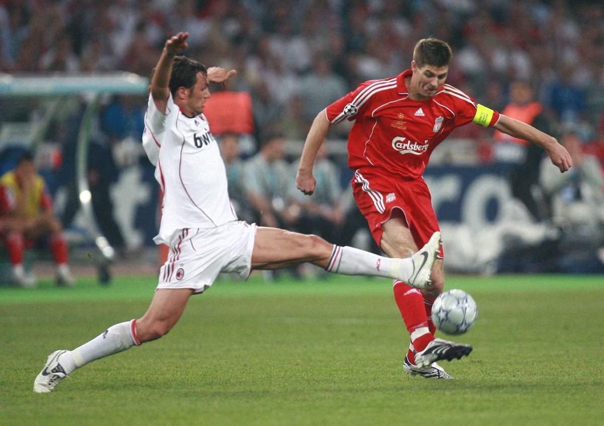 AC Milan's defender Paolo Maldini (L) vies with Liverpool's midfielder Steven Gerrard during the Champions League final football match against at the Olympic Stadium, in Athens, 23 May 2007. AC Milan won 2-1. AFP PHOTO / FRANCK FIFE (Photo by FRANCK FIFE / AFP)