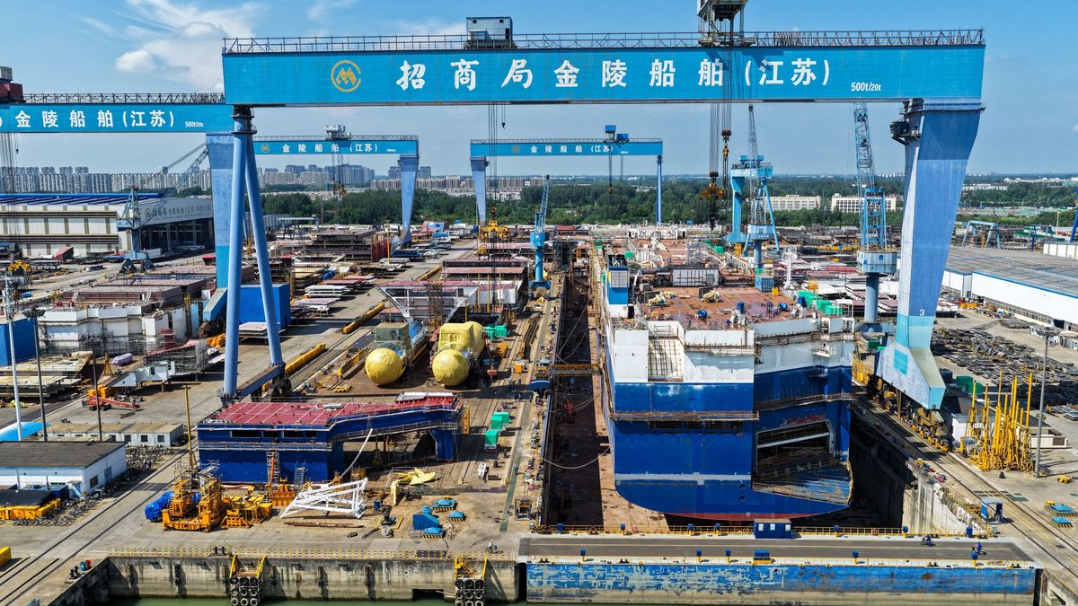 An aerial view shows a production scene at a shipyard in Yangzhou City, Jiangsu Province, China, on August 31, 2025. (Photo by Costfoto/NurPhoto) (Photo by CFOTO / NurPhoto via AFP)