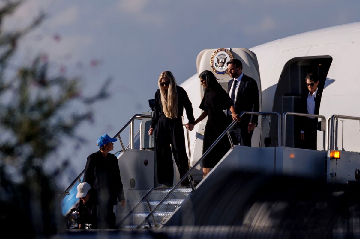PHOENIX, ARIZONA - SEPTEMBER 11: Vice President JD Vance (R) second lady Usha Vance (C) and Erika Kirk deplane Air Force Two while escorting the body of Charlie Kirk on September 11, 2025 in Phoenix, Arizona. Kirk, the CEO and co-founder of Turning Point USA, was shot and killed on Wednesday in Utah.   Eric Thayer/Getty Images/AFP (Photo by Eric Thayer / GETTY IMAGES NORTH AMERICA / Getty Images via AFP)