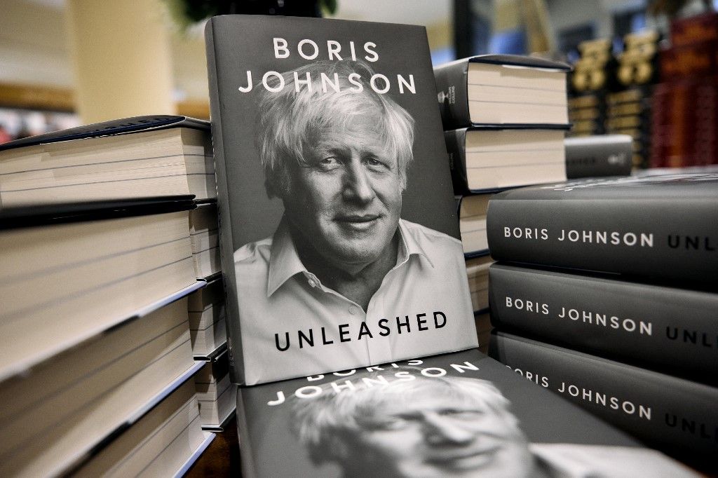Copies of "Unleashed" by former British prime minister Boris Johnson, are displayed at Waterstones' flagship Piccadilly bookshop on the day of its release in London, on October 10, 2024. Johnson's memoir, "Unleashed", hit shelves on October 10 and charts his rise in politics,  becoming London mayor, leading the "Leave" campaign during the 2016 Brexit referendum and becoming Tory leader in 2019 when he secured a landslide general election victory. Johnson was ousted in disgrace by colleagues fewer than three years later following a series of scandals, particularly the illegal Covid lockdown-breaking parties at Downing Street. (Photo by BENJAMIN CREMEL / AFP)