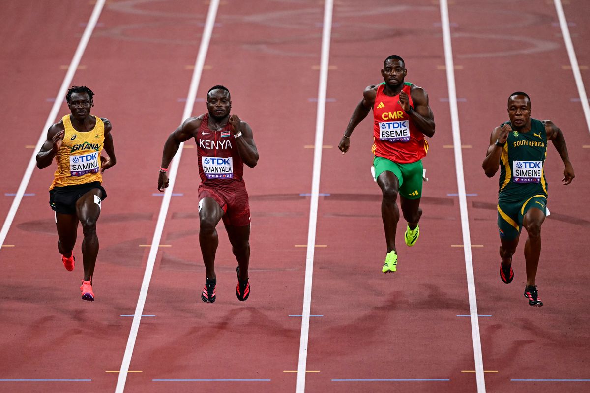 (From L) Ghana's Abdul-Rasheed Saminu, Kenya's Ferdinand Omanyala, Cameroon's Emmanuel Eseme and South Africa's Akani Simbine compete in the men's 100m heats during the World Athletics Championships in Tokyo on September 13, 2025. (Photo by Yuichi YAMAZAKI / AFP)
