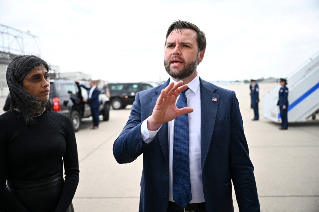 US Vice President JD Vance  speaks to the press as Second Lady Usha Vance looks on at MinneapolisSaint Paul International Airport after paying their respects to victims of the Annunciation Catholic Church shooting in Minneapolis, Minnesota, on September 3, 2025. On August 27 a shooter opened fire on school children attending a church service in Minneapolis, killing two pupils and wounding 17 people in the latest violent tragedy to jolt the United States. (Photo by Alex WROBLEWSKI / POOL / AFP)