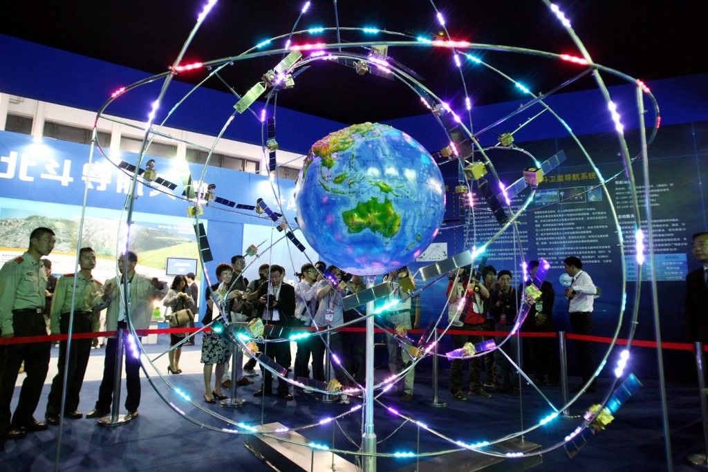 Visitors look at model satellites of the Beidou navigation system in the China Pavilion in Shanghai, China, 15 May 2011.

The Chinese government plans to upgrade its Beidou navigation system, rival of the US-developed GPS, the European Unions Galileo and Russias Global Navigation Satellite System, to offer services to customers in the Asia-Pacific region by 2012 and globally by 2020. China aims to have at least 10 Beidou navigation satellites in orbit before 2012 to cover the Asia-Pacific region and the final global system will consist of 35 satellites. (Photo by Shanghai Daily / Imaginechina via AFP)