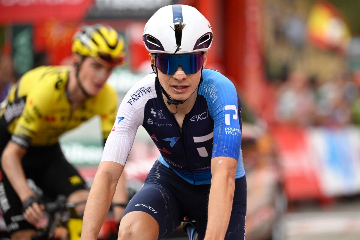 Team Israel Premier Tech 's US rider Matthew Riccitello crosses the finish line during the 14th stage of the Vuelta a Espana cycling tour, a 135 km race between Aviles and La Farrapona in Somiedo, on September 6, 2025. Cycling team Israel-Premier Tech removed their name from their kit at the Vuelta a Espana today after pro-Palestine protests aimed at them during the race. (Photo by Miguel RIOPA / AFP)