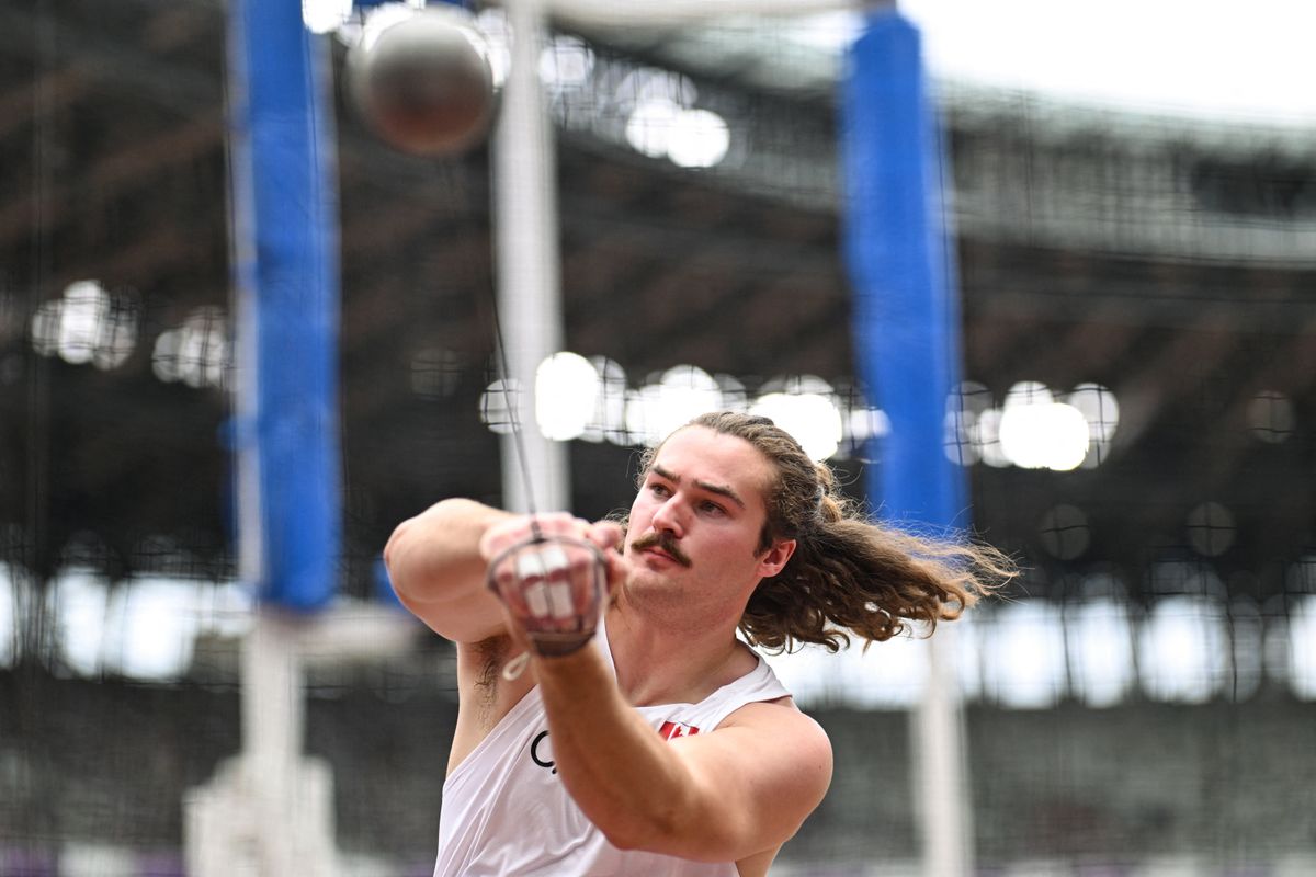 Canada's athlete Ethan Katzberg competes in the men's hammer throw Group B qualification during the World Athletics Championships in Tokyo on September 15, 2025. (Photo by Kirill KUDRYAVTSEV / AFP)