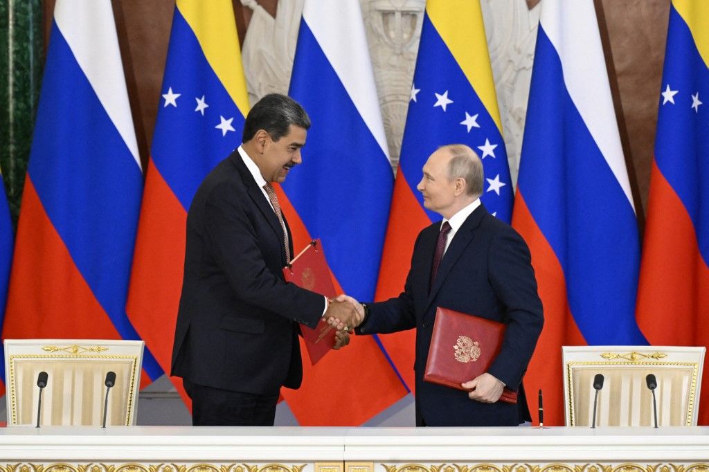 Russian President Vladimir Putin and Venezuelan President Nicolas Maduro attend a signing ceremony following their talks at the Kremlin in Moscow on May 7, 2025. (Photo by Alexander NEMENOV / AFP)