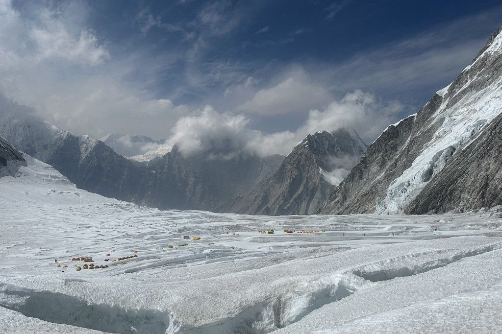 This photograph taken on May 4, 2024 shows mountaineers during their ascend to Mount Everest's summit, in Nepal. A 54-year-old Nepalese climber known as "Everest Man" reached the peak of the world's highest mountain for a record 30th time on May 22, 2024, three decades after his first summit. (Photo by TSERING PEMBA SHERPA / AFP)