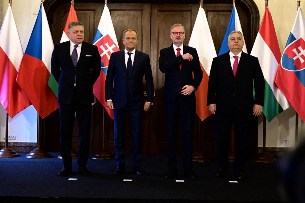 (L-R) Slovakia's Prime Minister Robert Fico, Poland's Prime Minister Donald Tusk, Hungary's Prime Minister Viktor Orban and Czech Republic's Prime Minister Petr Fiala pose for a family picture prior to the Visegrad Group (V4) meeting on February 27, 2024 in Prague, Czech Republic. (Photo by Michal Cizek / AFP)