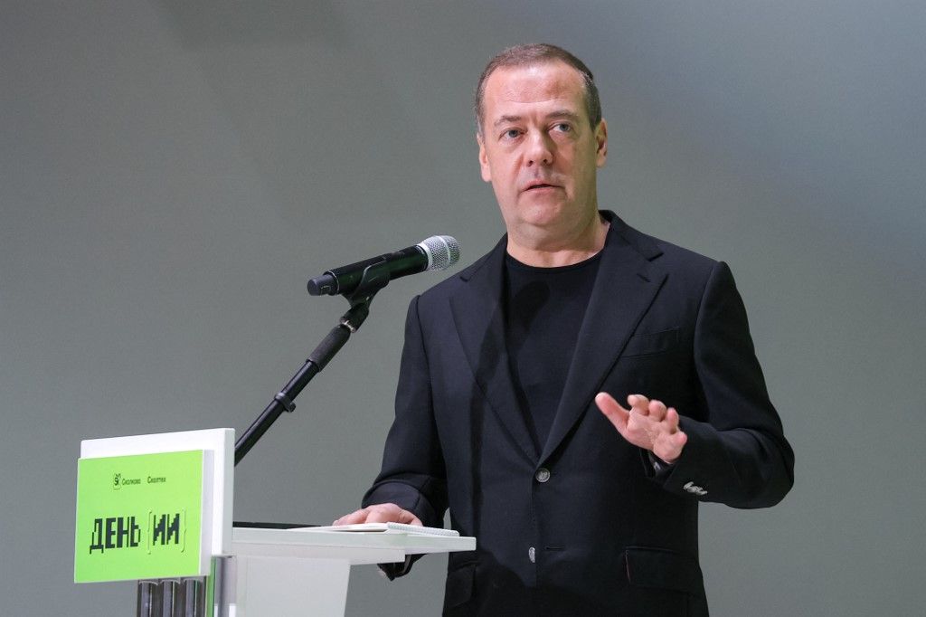 In this pool photograph distributed by the Russian state agency Sputnik, shows former president of Russia, Deputy Chairman of the Russian Security Council, and Head of the Skolkovo Foundation Board of Trustees Dmitry Medvedev, speaking during the AI Day, at the Skolkovo Innovation Centre, near Moscow on September 30, 2025. (Photo by Yekaterina SHTUKINA / POOL / AFP)