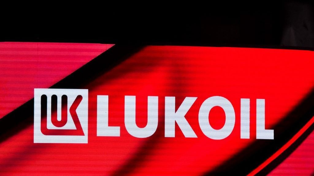 Russian oil giant Lukoil logo is pictured at the Saint Petersburg International Economic Forum (SPIEF) in Saint Petersburg on June 19, 2025. The 28th edition of Saint Petersburg International Economic Forum (SPIEF) takes place at the ExpoForum Convention and Exhibition Centre in Saint Petersburg on June 18-21, 2025. (Photo by Olga MALTSEVA / AFP)