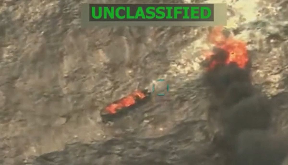 (FILES) This screen grab from a video posted by US President Donald Trump on his Truth Social account on September 15, 2025, shows what President Trump says is US Military forces conducting a strike on a boat carrying alleged drug traffickers in the Caribbean Sea in the SOUTHCOM area of responsibility on Monday, September 15, 2025. Venezuela said on September 19, 2025, it would seek a United Nations probe of US strikes that killed 14 alleged drug traffickers on at least two boats in international waters off its coast. (Photo by HANDOUT / US President Donald Trump's TRUTH Social account / AFP) / RESTRICTED TO EDITORIAL USE - MANDATORY CREDIT "AFP PHOTO / US President Donald Trump's TRUTH Social account / HANDOUT"- HANDOUT - NO MARKETING NO ADVERTISING CAMPAIGNS - DISTRIBUTED AS A SERVICE TO CLIENTS