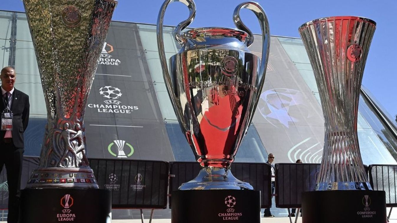 trófea, BL, El, Kl, iants cups representing (from L) the UEFA Europa League trophy, the UEFA Champions League Trophy and the UEFA Conference League trophy are displayed outside the Grimaldi forum in Monaco on August 29, 2025. (Photo by Frederic DIDES / AF