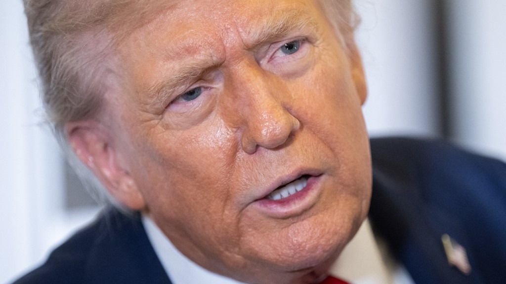US President Donald Trump speaks with the media aboard Air Force One as he flies from Washington, DC to Israel, October 12, 2025. Trump is passing through Israel, addressing parliament and meeting with hostage families before heading to Egypt's Sharm El-Sheikh for a major peace summit, where a "document ending the war in the Gaza Strip" is expected to be signed. (Photo by SAUL LOEB / AFP)