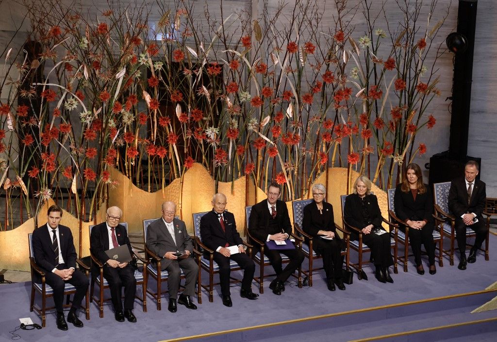 (L-R) The Chair of the Norwegian Nobel Committee Jorgen Watne Frydnes, the representatives of the 2024 Nobel Peace Prize winner Japan's atomic bomb survivors' group Nihon Hidankyo, Terumi Tanaka, Shigemitsu Tanaka and Toshiyuki Mimaki, the and deputy chairman of the Nobel Committee Toje Asle  and others attend the 2024 Nobel Peace Prize award ceremony on December 10, 2024 at Oslo City Hall in Oslo, Norway. Survivors of the US atomic bombings of Japan received the Nobel Peace Prize 2024 but, after years of anti-nuclear campaigning and showing the world their scars, they still retain the painful memories of the discrimination they have faced. (Photo by Odd ANDERSEN / AFP)