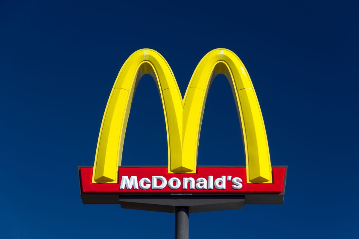 VALENICA, CA/USA - AUGUST 5, 2014: McDonald's restauraunt sign. The McDonald's Corporation is the world's largest chain of hamburger fast food restaurants.