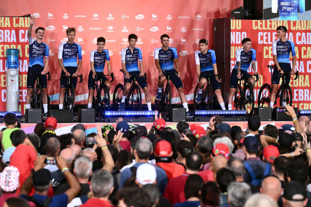 Team Israel-Premier Tech is seen during the official teams presentation of the 80th edition of 'La Vuelta' cycling tour of Spain, in Torino, Italy on August 21, 2025. (Photo by Marco BERTORELLO / AFP)