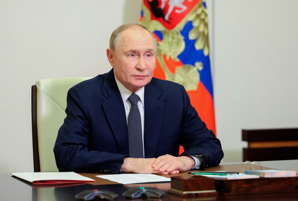 In this pool photograph distributed by the Russian state agency Sputnik, Russia's President Vladimir Putin chairs a Security Council meeting via a videoconference at the Novo-Ogaryovo state residence outside Moscow on October 7, 2025. (Photo by Alexei Babushkin / POOL / AFP)