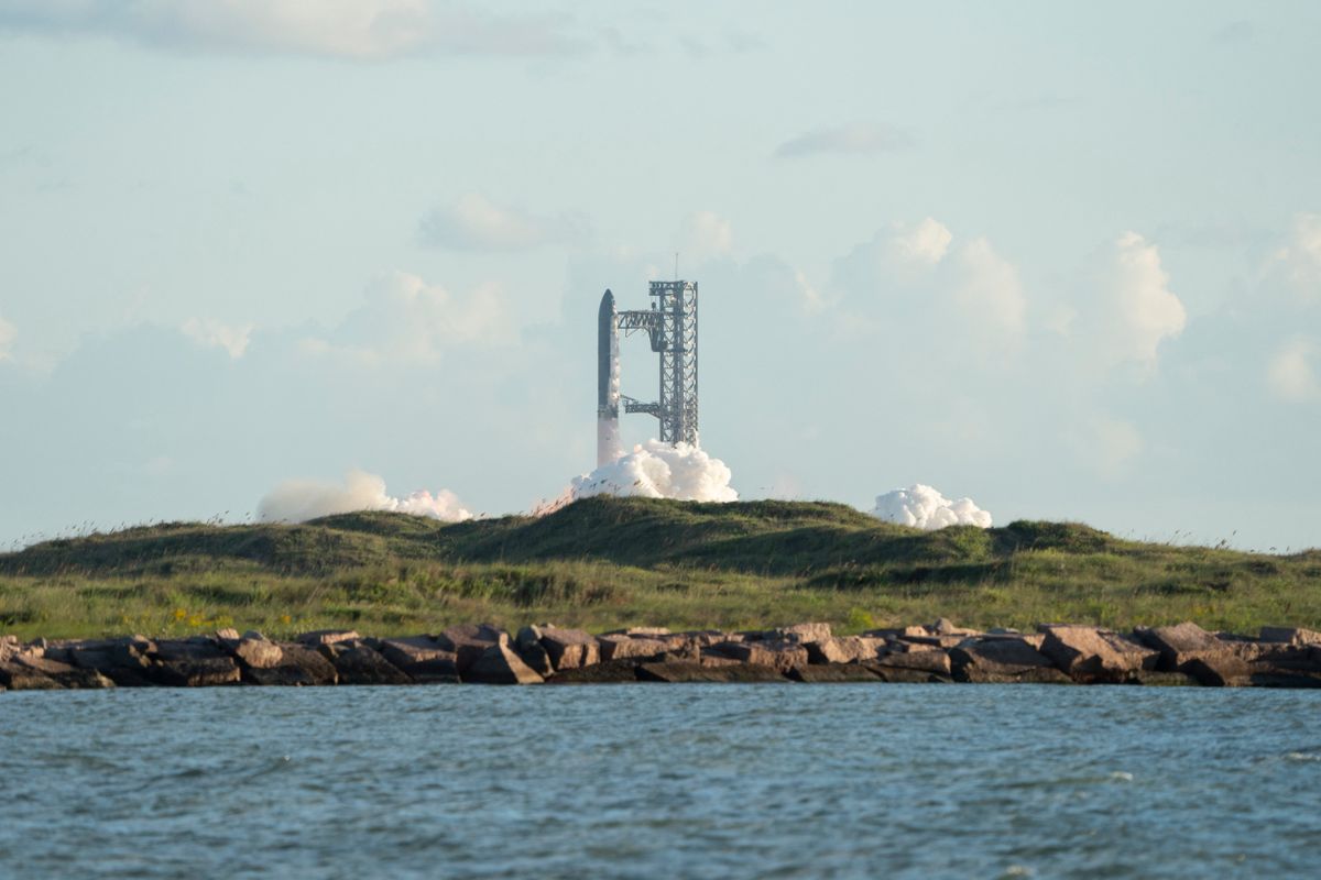 SpaceX's Starship rocket 38 is seen before launching during the 11th test flight on October 13, 2025 as seen from South Padre Island in Texas. (Photo by Gabriel V. Cardenas / AFP)