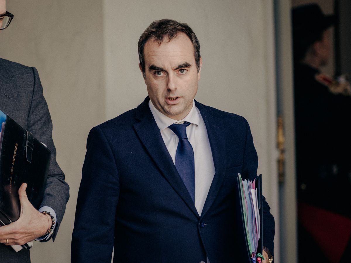 French Prime Minister Sebastien Lecornu leaves after the weekly council of ministers of the new government in the main courtyard of the Presidential Elysee Palace in Paris France on October 14, 2025. (Photo by Bastien Ohier / Hans Lucas via AFP)