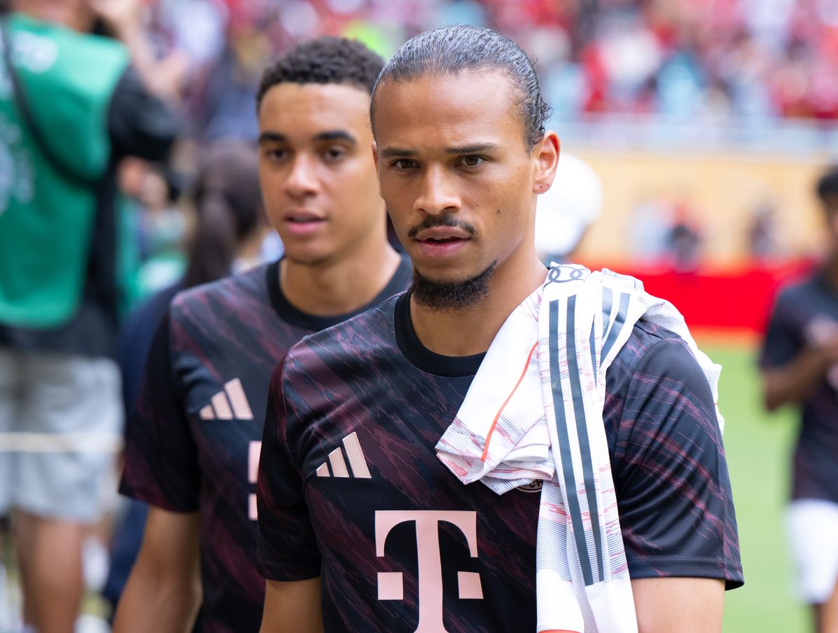 29 June 2025, USA, Miami: Soccer: Club World Cup, Flamengo - Bayern Munich, final round, round of 16 at the Hard Rock Stadium. Jamal Musiala (l) and Leroy Sane of Munich enter the stadium before the game. Photo: Sven Hoppe/dpa