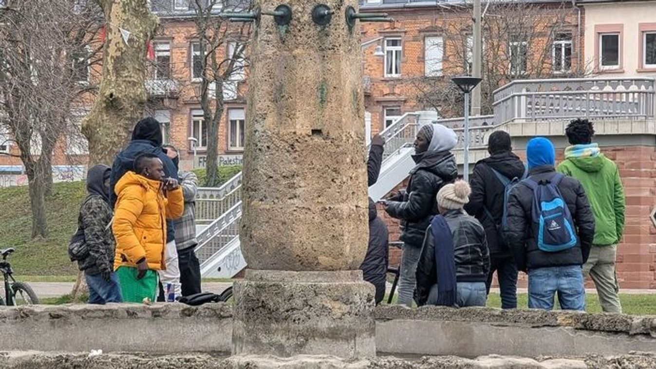 A group of African migrants gather in a park in Germany (Photo: AFP)