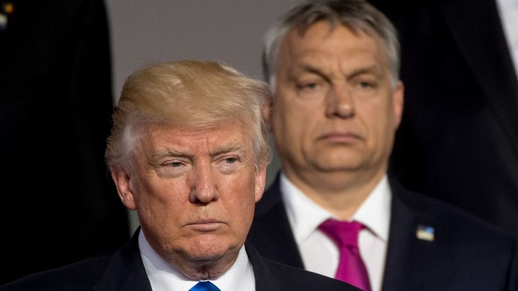 (L-R)US President Donald Trump and Prime Minister of  of Hungary Viktor Orban stand during a family picture during the NATO (North Atlantic Treaty Organization) summit at the NATO headquarters, in Brussels, on May 25, 2017. (Photo by Danny GYS / POOL / AFP)