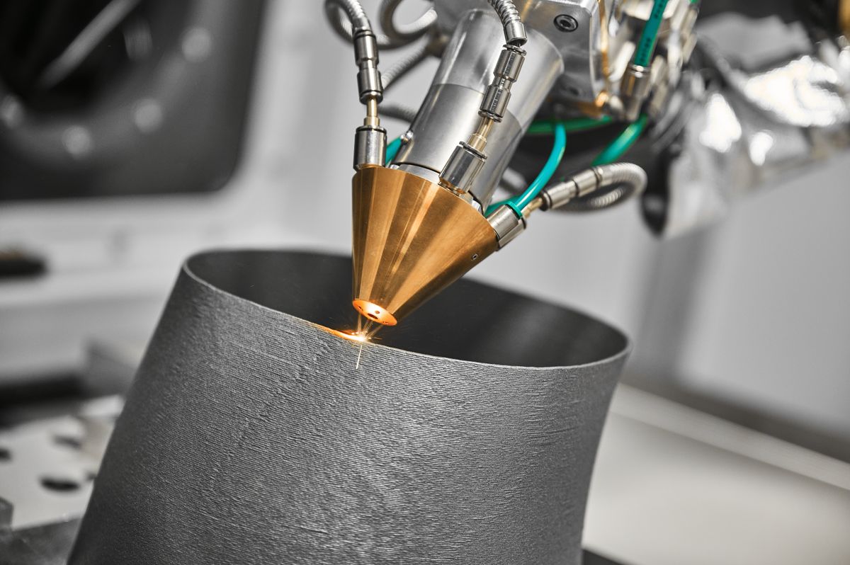 3d printer makes mechanical detail with metal powder in shop
3D fémnyomtatás