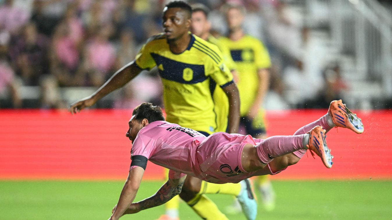 Messi
Inter Miami's Argentine forward Lionel Messi watches the ball as he scores with a header during the Major League Soccer (MLS) playoff football match between Inter Miami and Nashville SC at Chase Stadium in Fort Lauderdale, Florida on October 24, 202