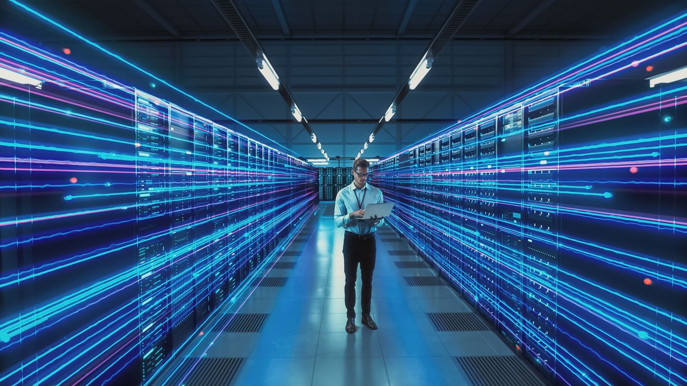 Futuristic Concept: Data Center Chief Technology Officer Holding Laptop, Standing In Warehouse, Information Digitalization Lines Streaming Through Servers. SAAS, Cloud Storage, Online Service
2200880615
Illusztráció
Shutterstock
Gorodenkoff