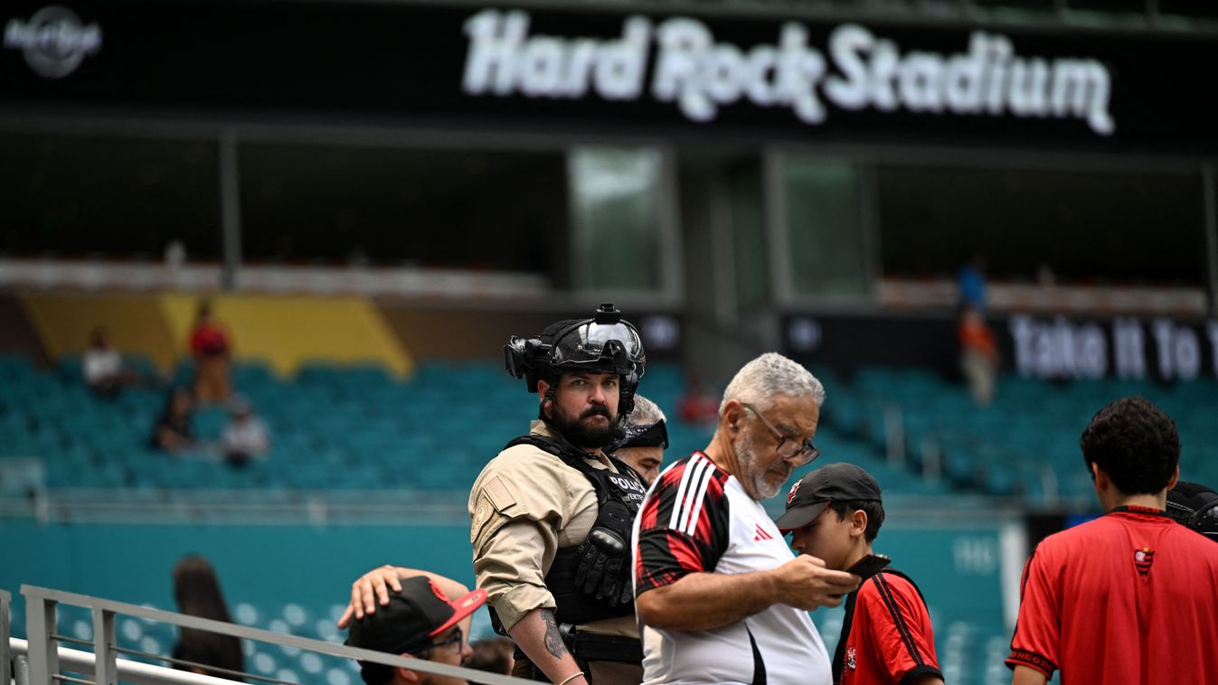 Barcelona
A counterterrorism police officer looks on as fans arrive before the FIFA Club World Cup 2025 round of 16 football match between Brazil's Flamengo and Germany's Bayern Munich at the Hard Rock Stadium in Miami on June 29, 2025. (Photo by PATRICIA