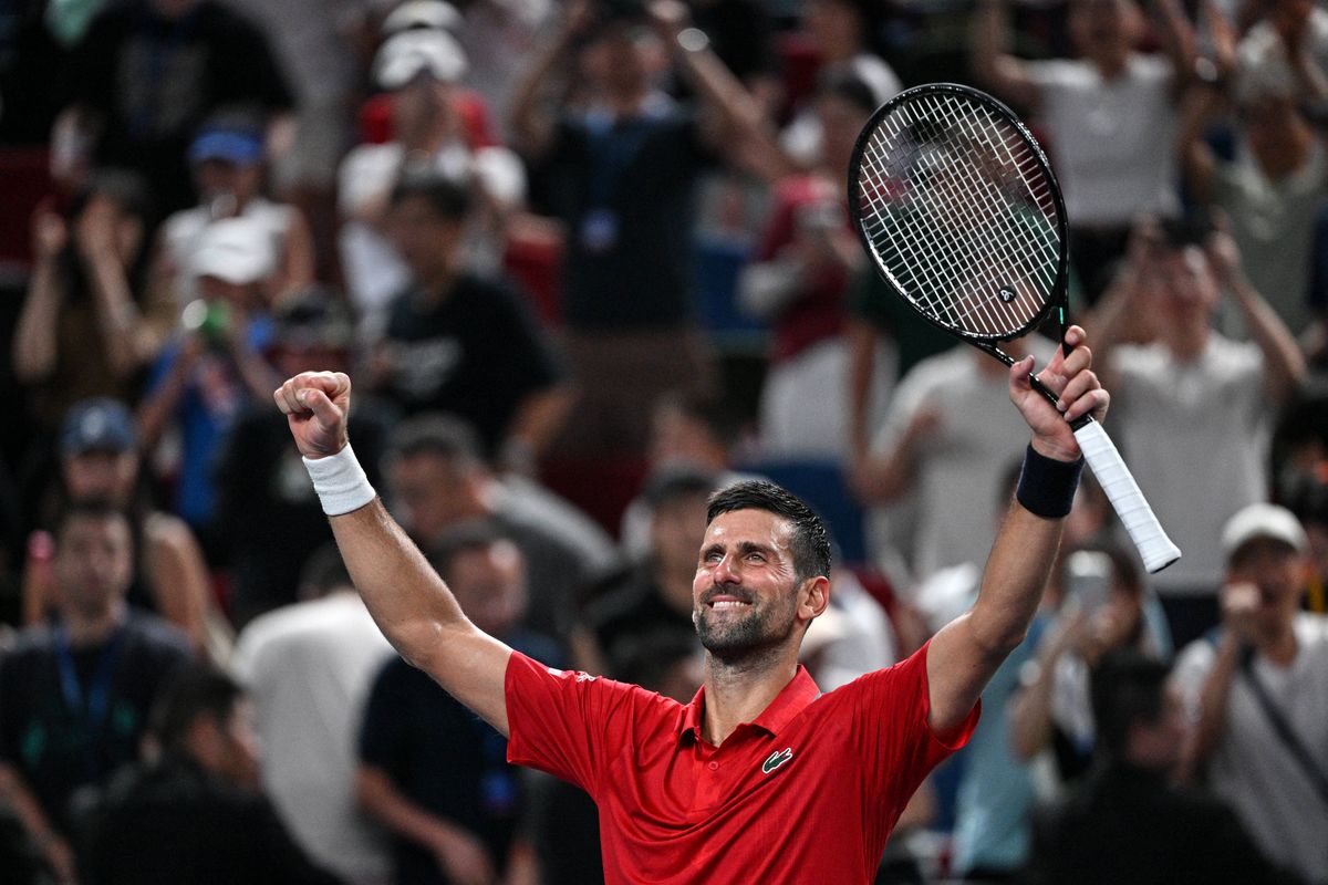 Serbia's Novak Djokovic celebrates after winning against Spain's Jaume Munar during their men's singles match at the Shanghai Masters tennis tournament in Shanghai on October 7, 2025. (Photo by Hector RETAMAL / AFP)