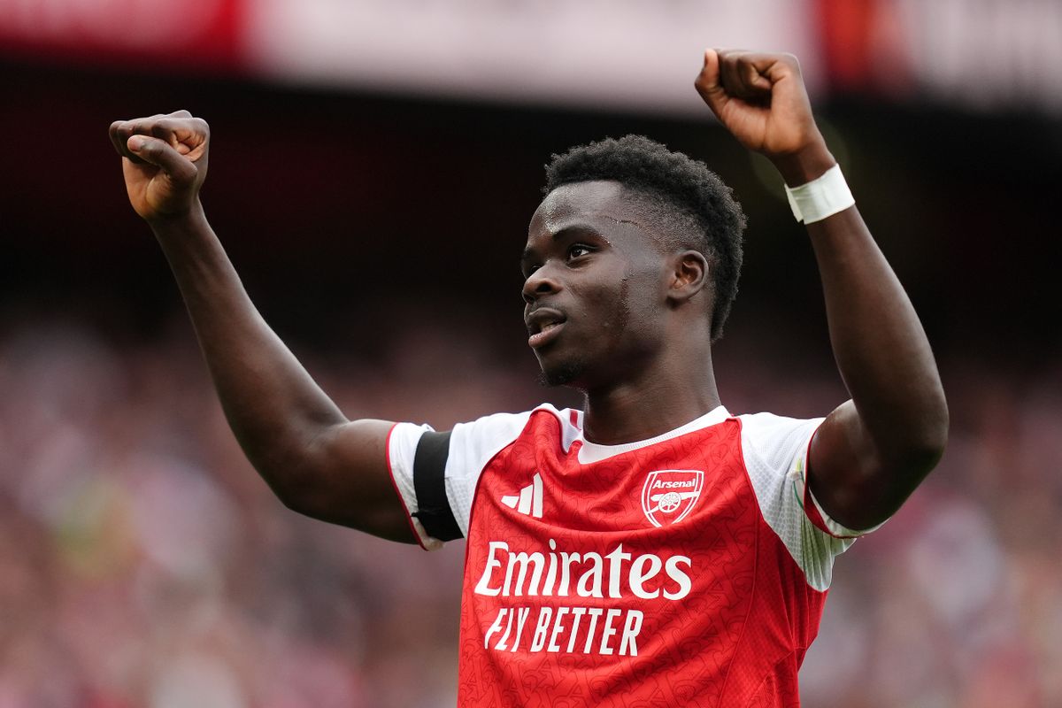 Arsenal's Bukayo Saka celebrates scoring their side's second goal of the game during the Premier League match at the Emirates Stadium, London. Picture date: Saturday August 23, 2025.