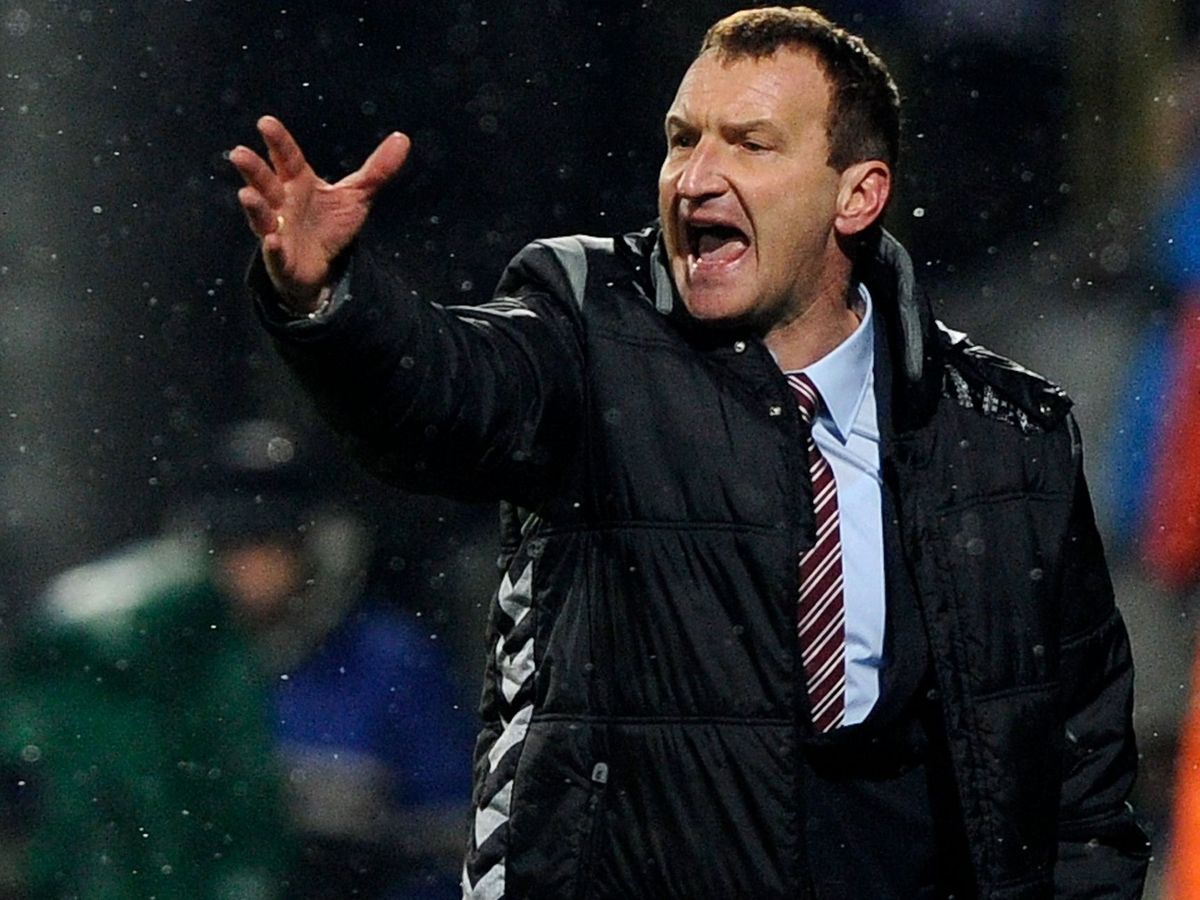 Lithuania's head coach Csaba Laszlo reacts during the Slovakia vs Lithuania FIFA 2014 World Cup qualifying football match in Zilina, on March 22, 2013.  AFP PHOTO / SAMUEL KUBANI (Photo by SAMUEL KUBANI / AFP)